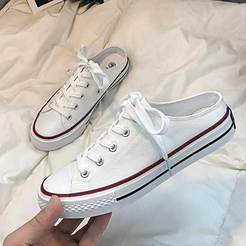 Women's round toe lace-up canvas sneakers by Trendsi, lightweight casual flat shoes with a classic design and comfortable fit.