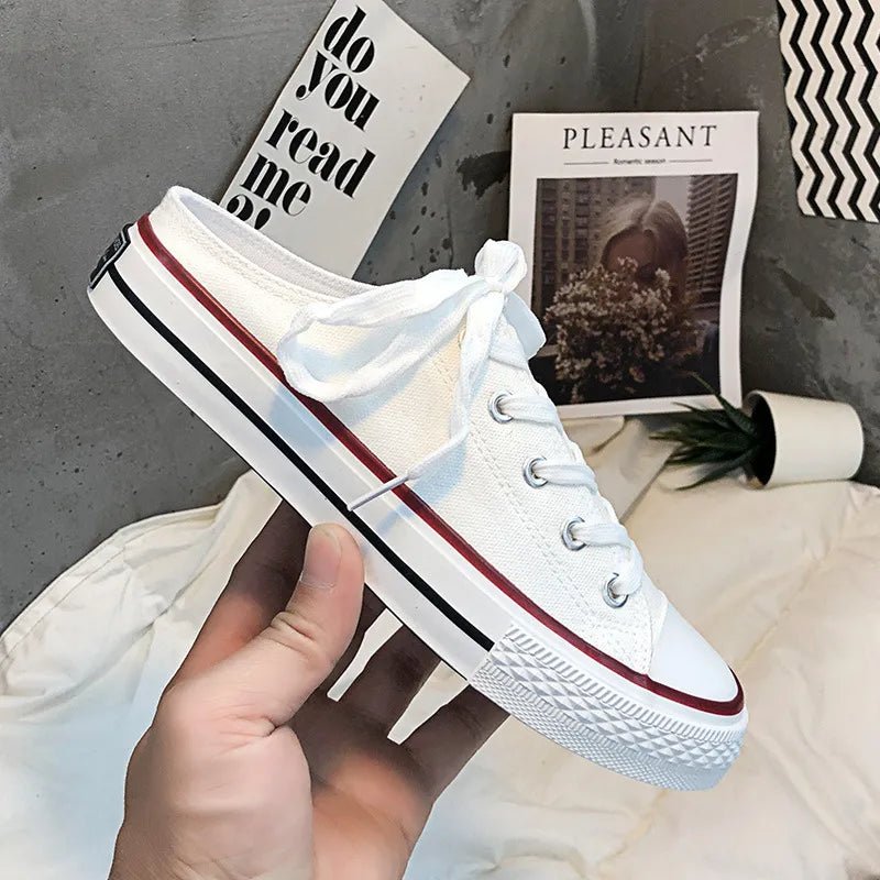 Women's round toe lace-up canvas sneakers by Trendsi, lightweight casual flat shoes with stylish design and comfortable fit.