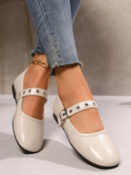 Classic round toe Mary Jane loafers in premium PU leather featuring a stylish, comfortable shoe design with a low heel.