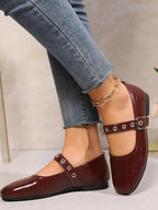 Classic round toe Mary Jane loafers in premium PU leather with strap detail, stylish and comfortable shoe by Trendsi.