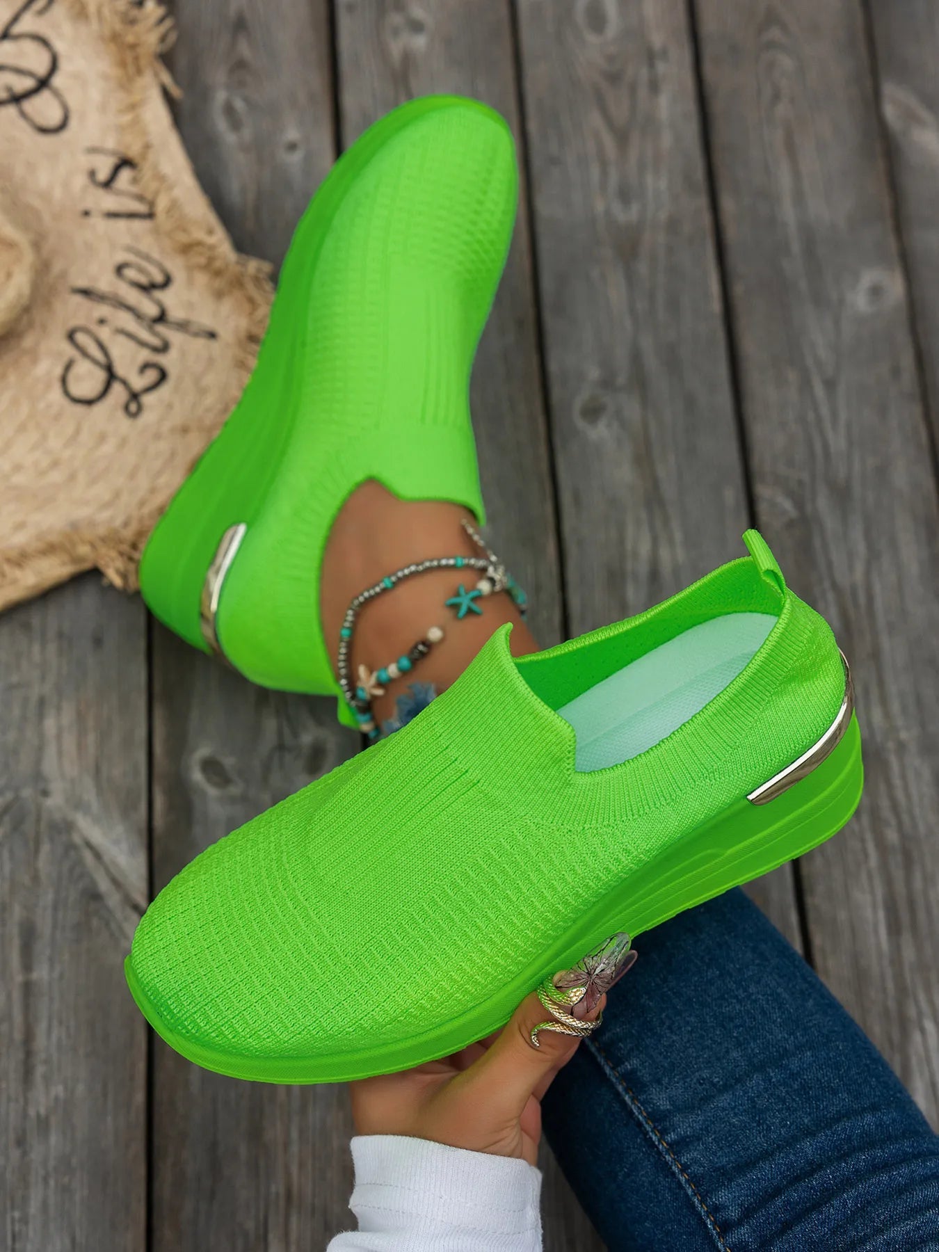 Women's round toe wedge sneakers by Trendsi featuring breathable fabric and stylish comfort footwear design.
