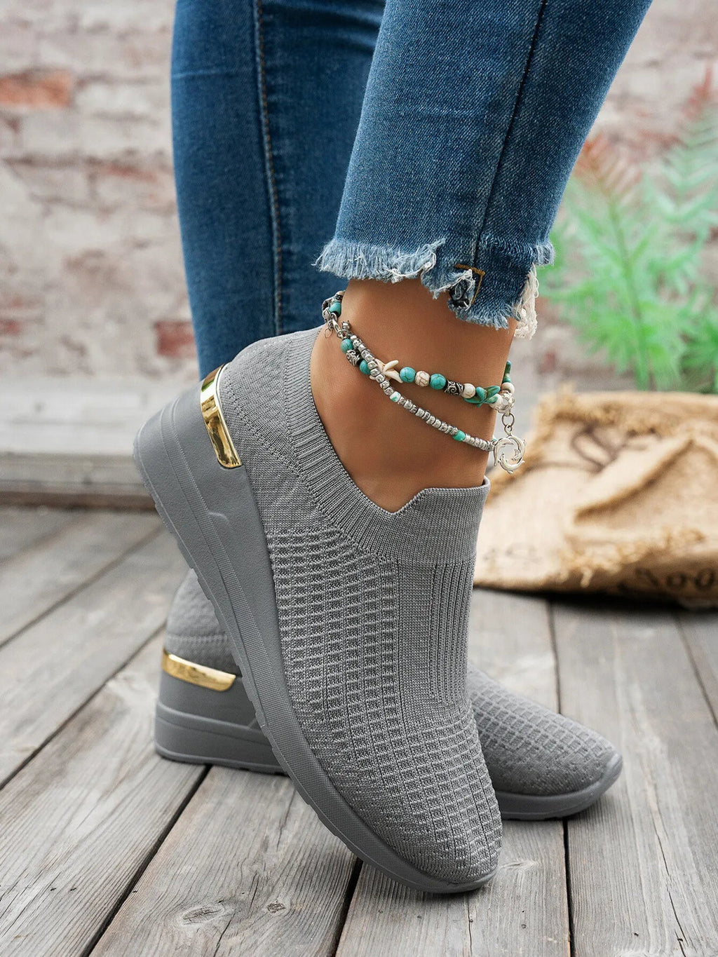 Women's round toe wedge sneakers by Trendsi featuring breathable fabric and casual fashion design.