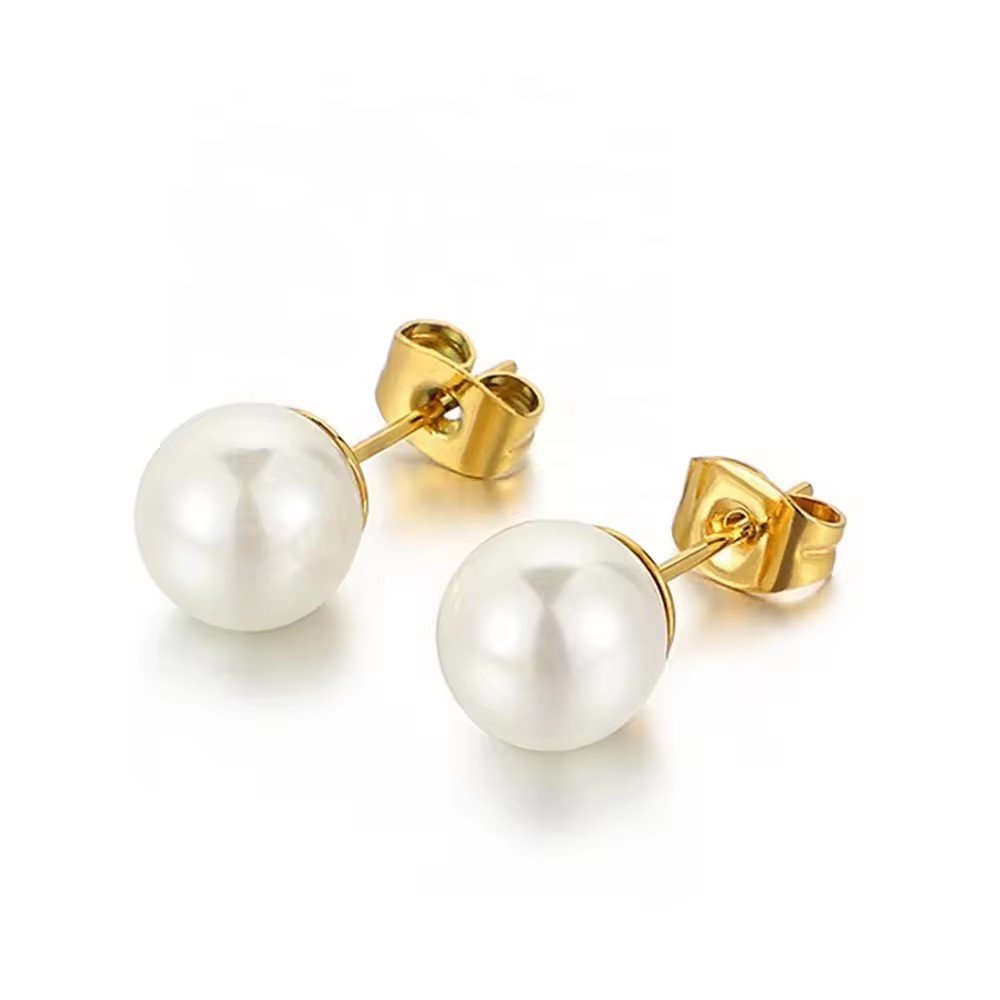 Sterling silver needle earrings with natural freshwater pearls, featuring elegant pearl studs for a sophisticated look.