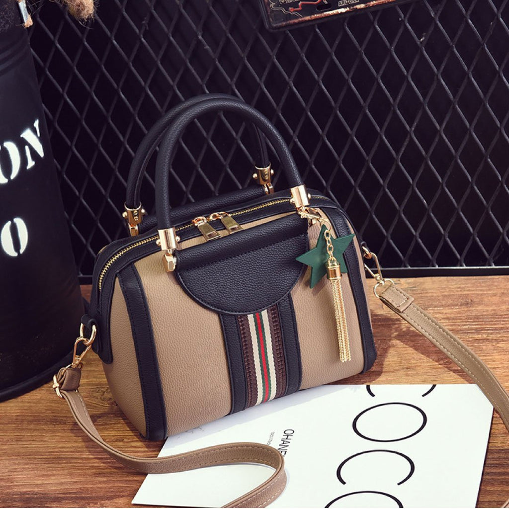 Plush Fashion Hub Sally Shoulder Bag in sleek design with a top handle and adjustable strap, made of soft leather.