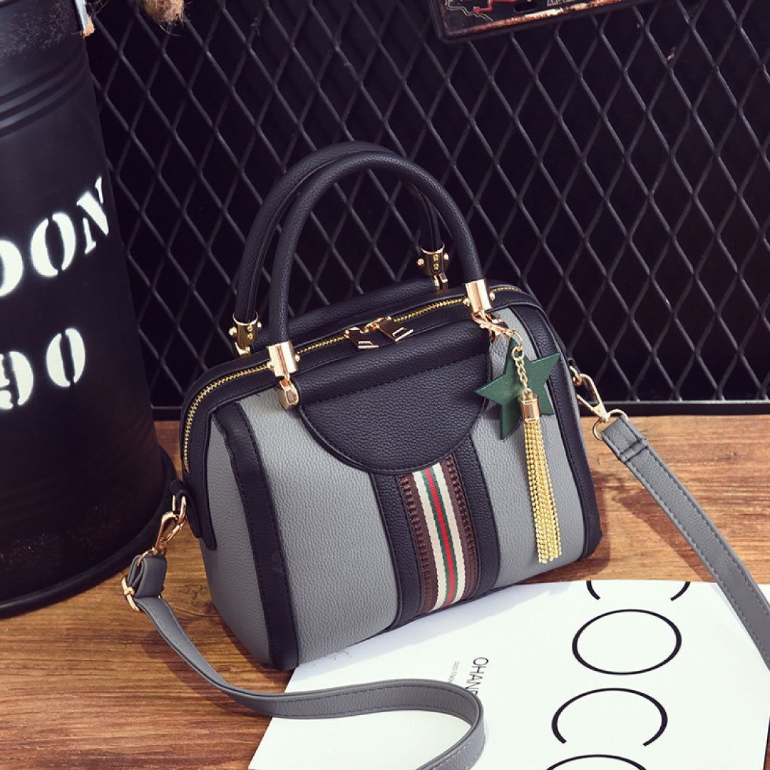 Plush Fashion Hub Sally shoulder bag in black with gold hardware, featuring a sleek design and adjustable strap.