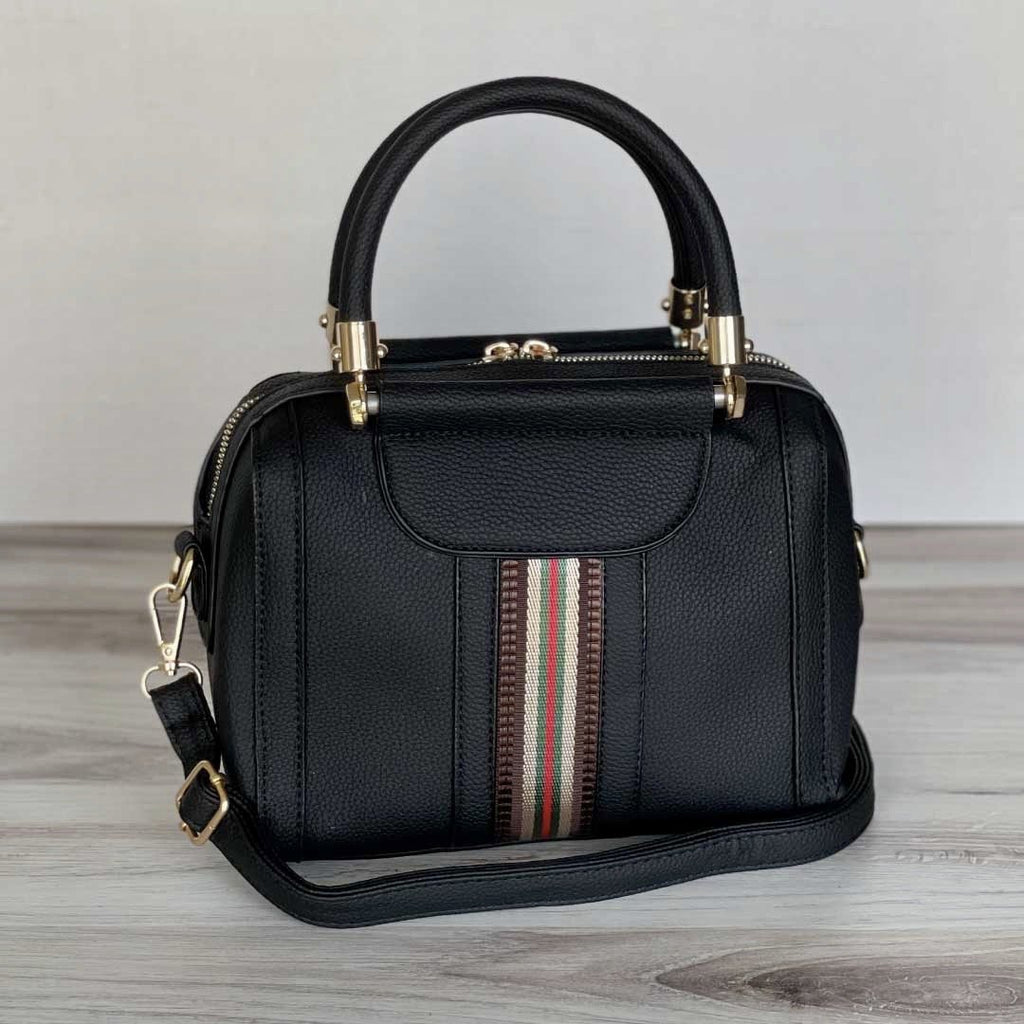 Plush Fashion Hub Sally shoulder bag with a sleek design, top handle, and adjustable strap, made of smooth leather.