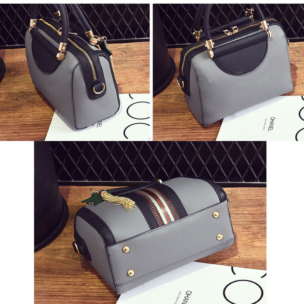 Plush Fashion Hub Sally shoulder bag with adjustable strap, stylish design, and spacious interior for everyday use.