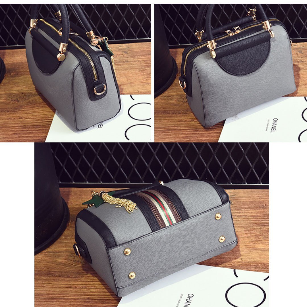Plush Fashion Hub Sally shoulder bag with adjustable strap, stylish design, and spacious interior for everyday use.
