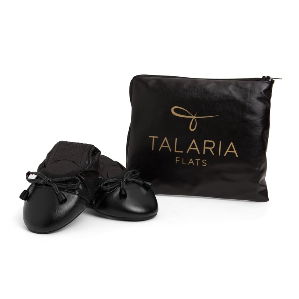 Black flats shoes by Plush Fashion Hub with a sleek, minimalist design and comfortable slip-on style.