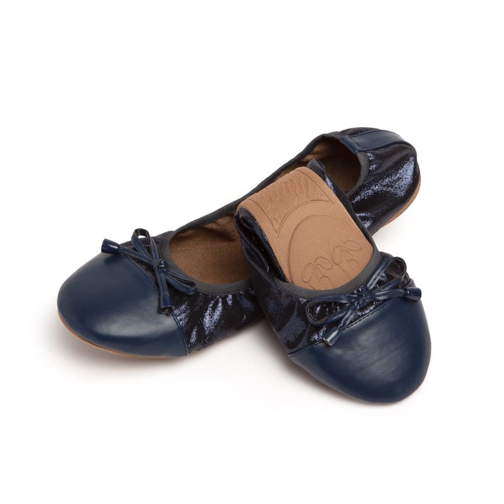 Pair of Talaria Flats in navy blue, premium women’s footwear with a sleek, comfortable design and subtle stitching details.