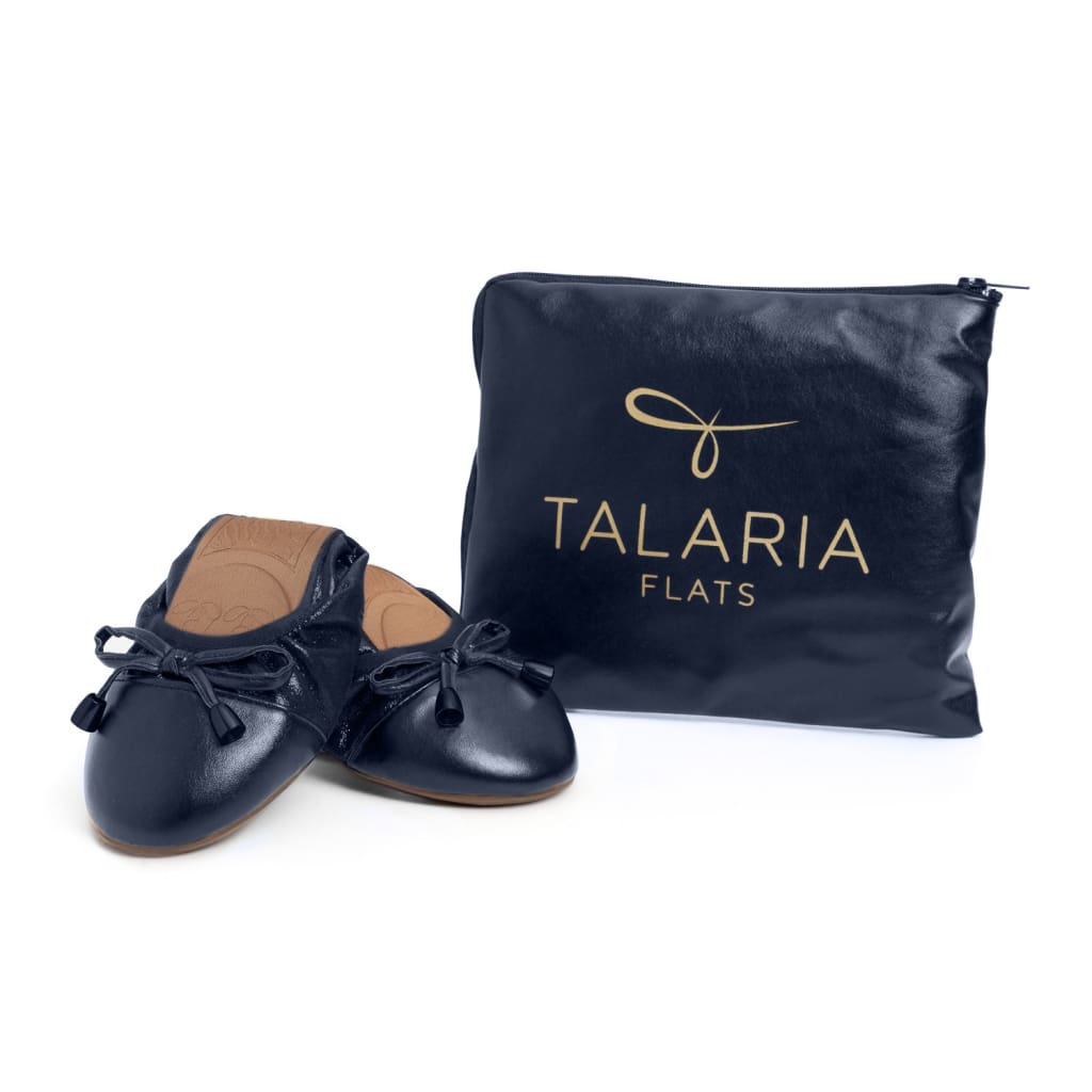 Talaria Flats navy blue footwear showing sleek, comfortable flats with pointed toes and stylish design.