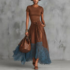 Casualwear set featuring a short-sleeve top and lace-panel midi skirt by Plush Fashion Hub, displayed on a neutral background.