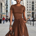 Casualwear short-sleeve top and lace-panel midi skirt set by Plush Fashion Hub, shown on a model with stylish accessories.