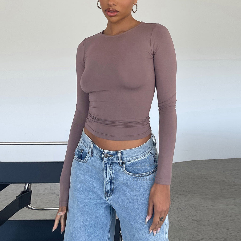 Slim fit long sleeve casual crop top for women by Plush Fashion Hub, shown in a stylish, fitted design perfect for everyday wear.