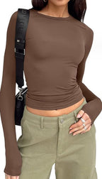 Women's slim fit long sleeve casual crop top from Plush Fashion Hub, styled with a modern, fitted design for everyday wear.