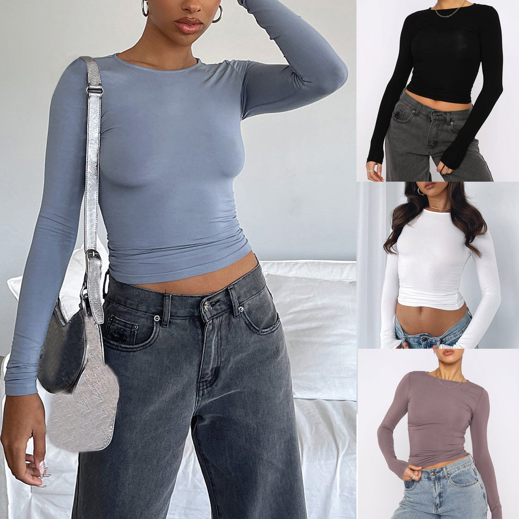 Women's slim fit long sleeve casual shirt from Plush Fashion Hub, styled as a trendy crop top with a modern fit.