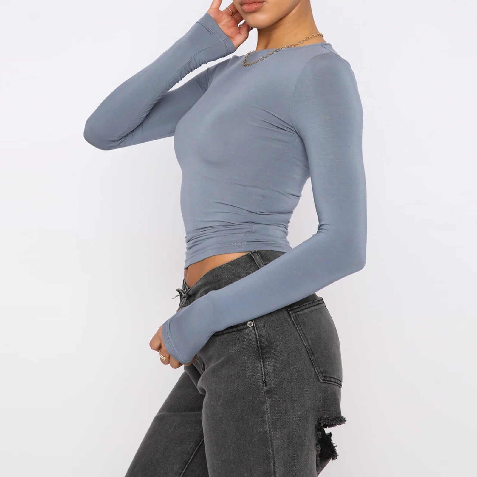 Slim fit women's long sleeve casual crop top from Plush Fashion Hub, shown styled for relaxed, everyday wear.
