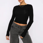 Slim fit women's long sleeve casual shirt by Plush Fashion Hub, stylish crop top for everyday wear, shown on a model.