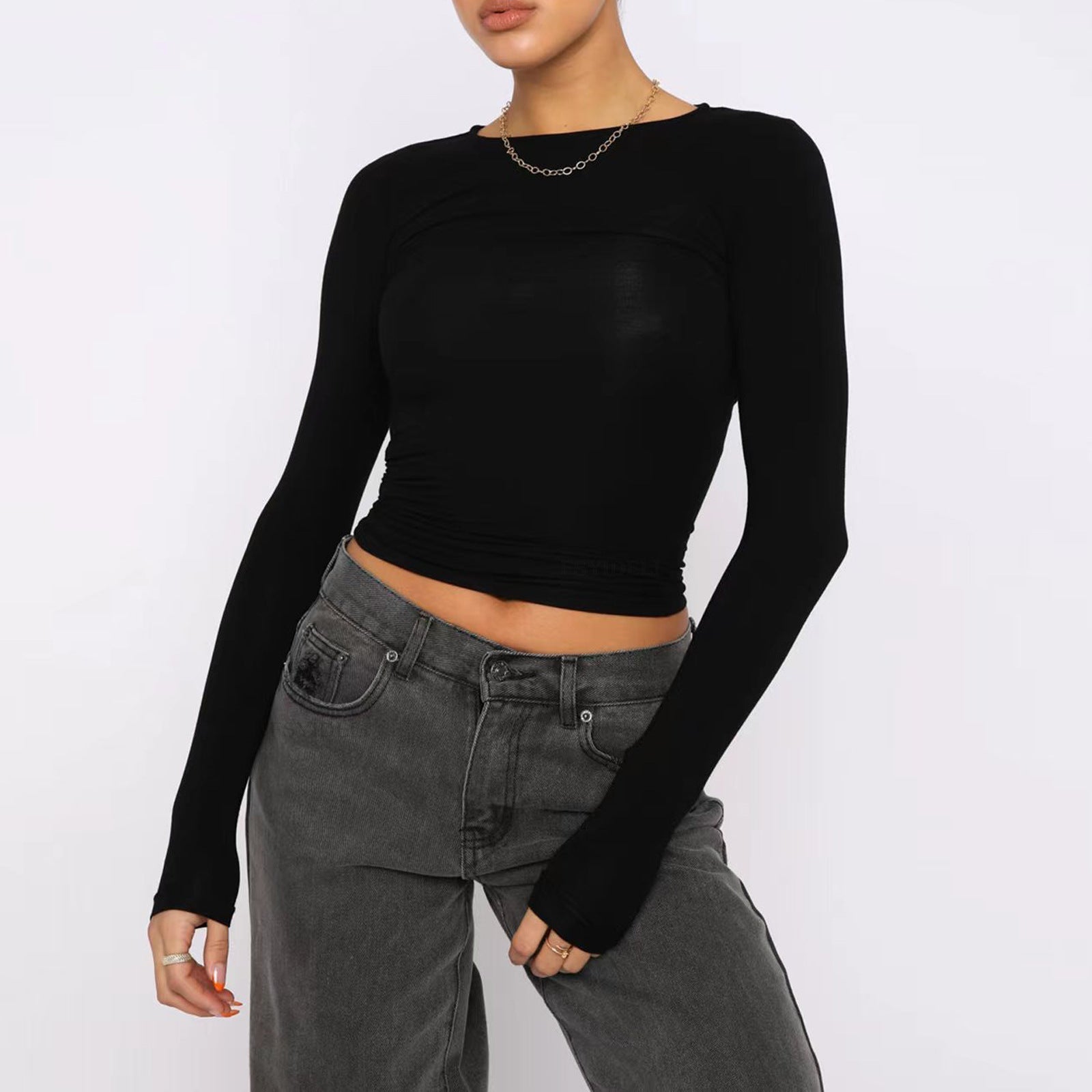 Slim fit women's long sleeve casual shirt by Plush Fashion Hub, stylish crop top for everyday wear, shown on a model.