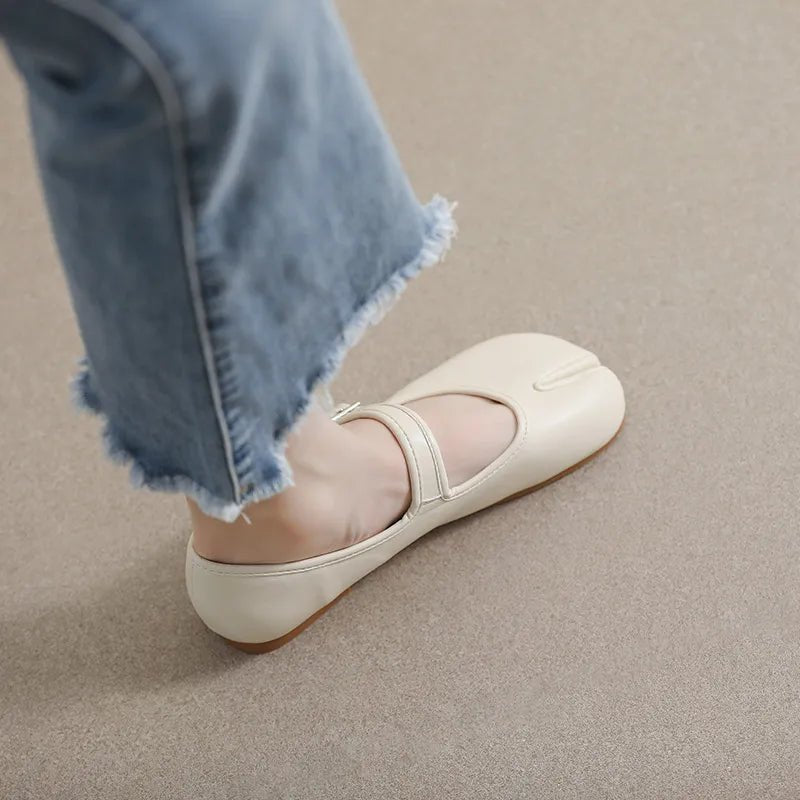 Women's split-toe PU leather flat slip-on shoes with comfortable casual design, featuring a sleek, minimalist style for everyday wear.