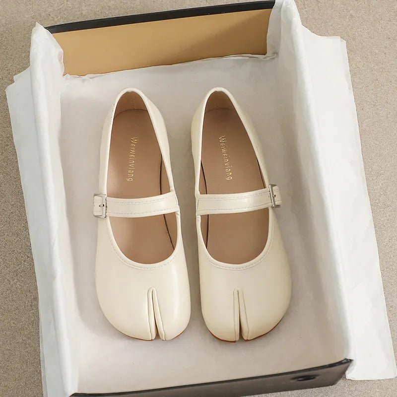 Women's split-toe PU leather flat slip-on shoes with a casual design, featuring comfortable and stylish slip-on flats.