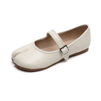 Women's split-toe PU leather flat slip-on shoes with a comfortable casual design, featuring a sleek and modern look.