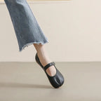 Women's split-toe PU leather flat slip-on shoes with a comfortable casual design, featuring a stylish and modern look.