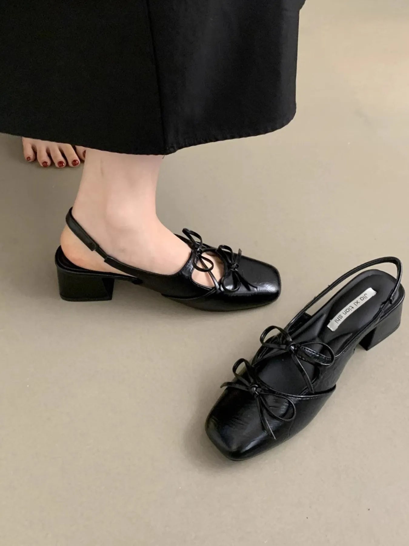 Women's square toe slingback ballet flats with bow-tie detail, stylish slip-on shoe by Trendsi.
