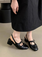 Women's square toe slingback ballet flats with bow-tie detail, stylish and comfortable shoe by Trendsi.