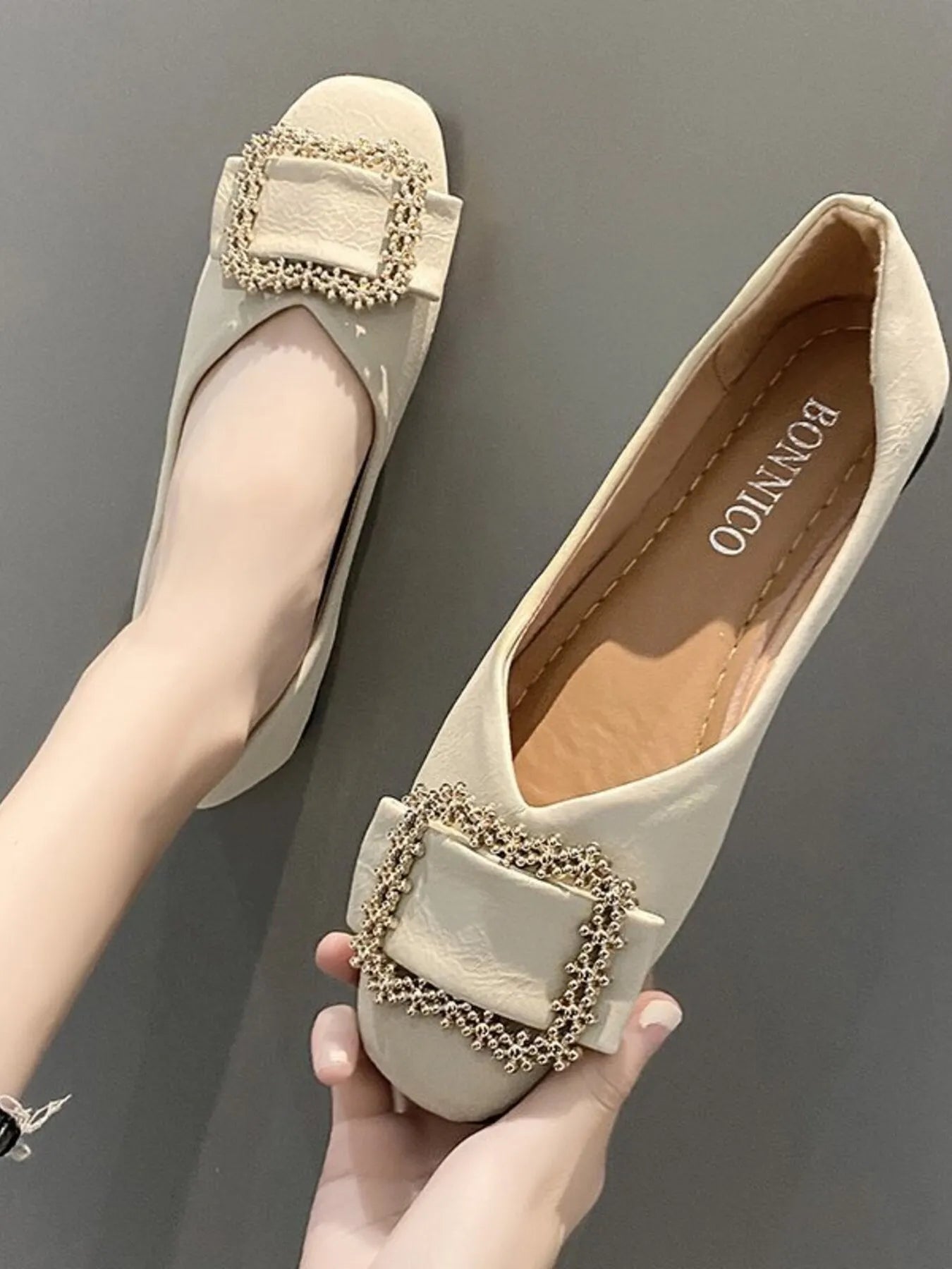 Women's square toe buckle flats made of faux leather with stylish loafer design and buckle detail.