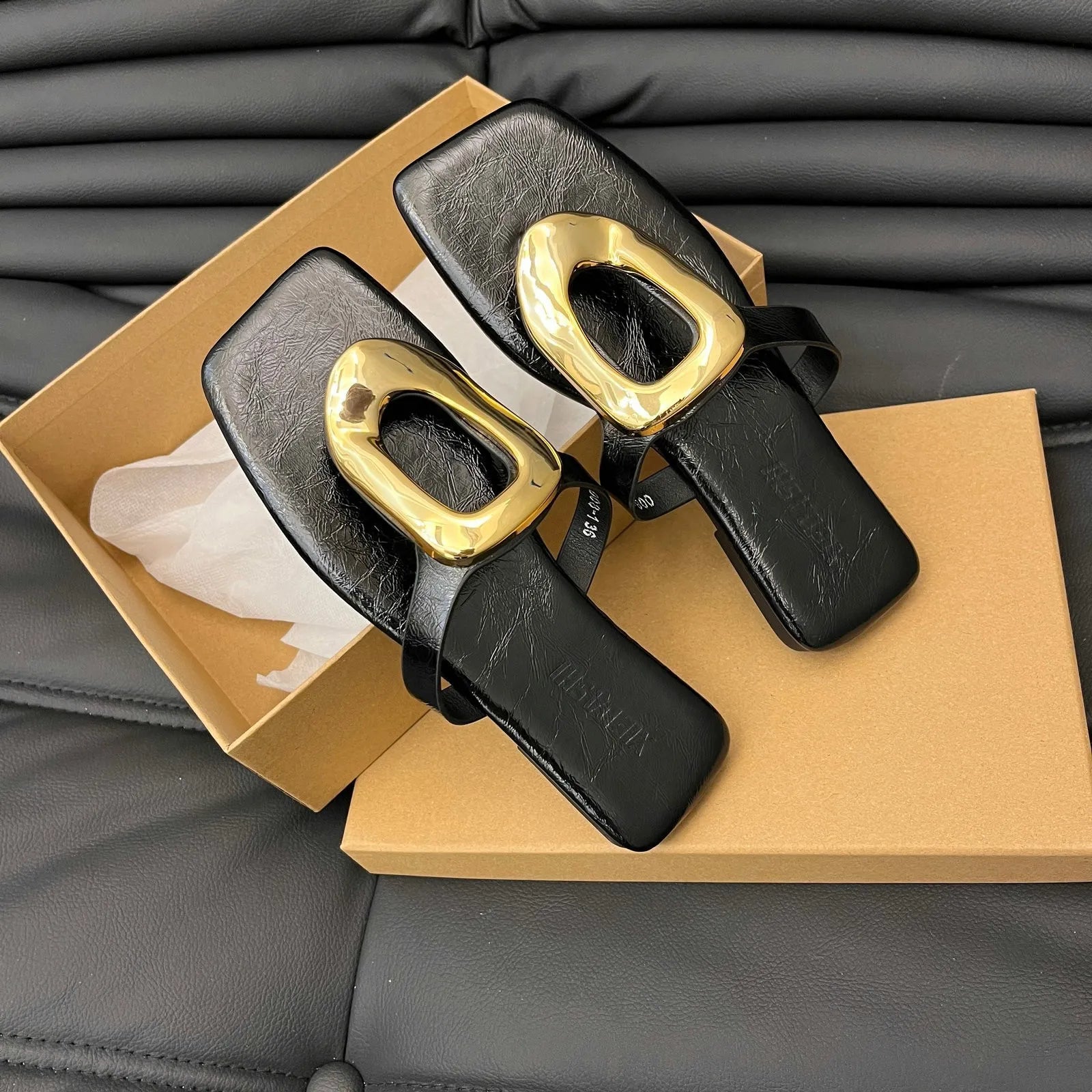 Women's chic square toe flat sandals with metallic detail, featuring a stylish and comfortable shoe design from Trendsi.