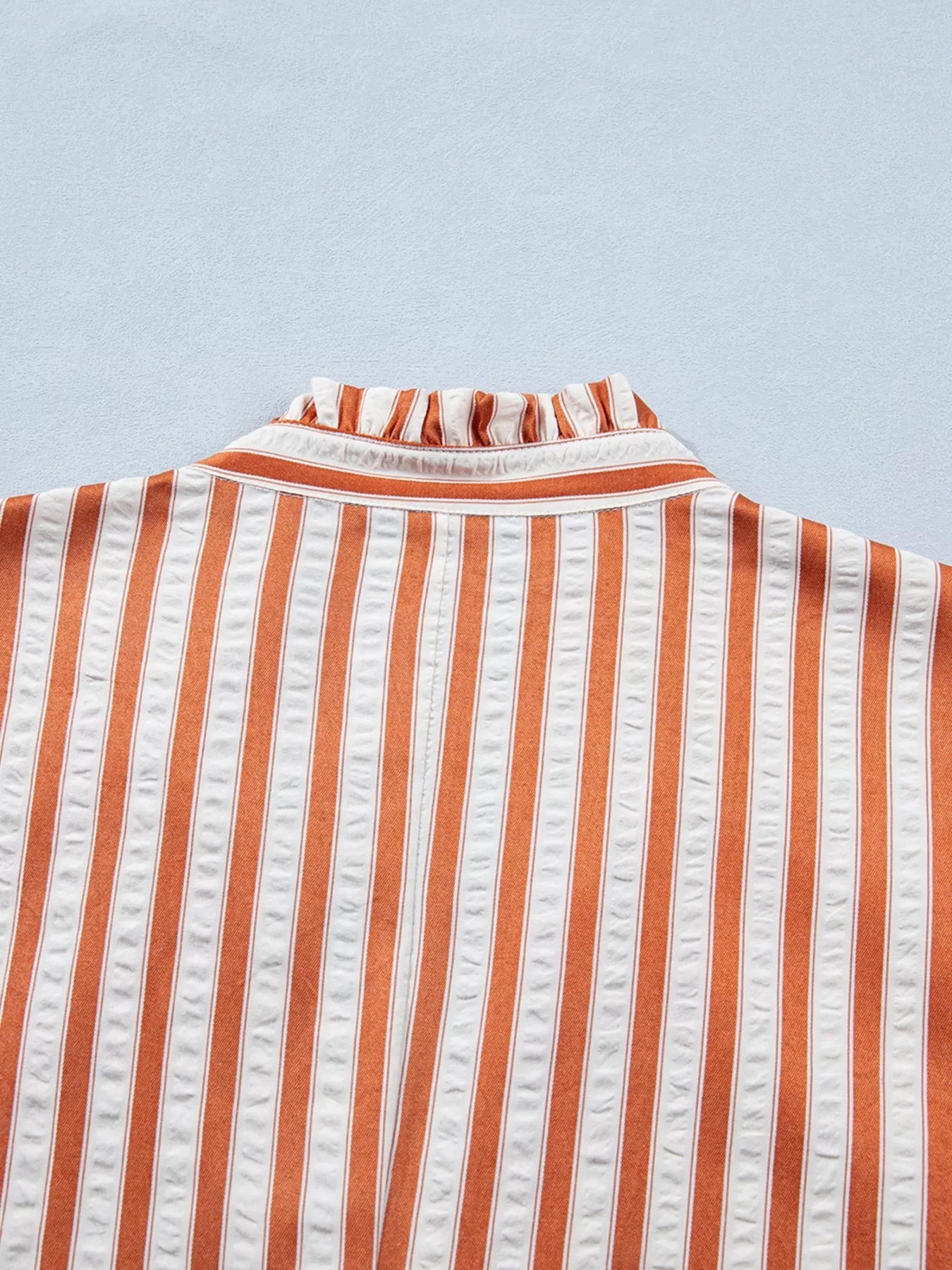 Plush Fashion Hub stripe pinched V-neck mini dress with turn-up cuffs and pockets, stylish and fitted for a casual look.