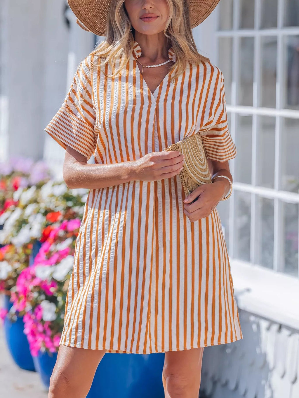 Stripe pinched V-neck mini dress with turn-up cuffs and pockets, stylish and casual from Plush Fashion Hub.