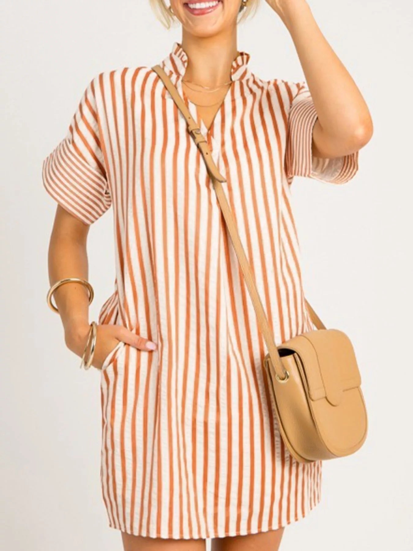 Stripe pinched V-neck mini dress with turn-up cuffs and pockets, stylish dress by Plush Fashion Hub.
