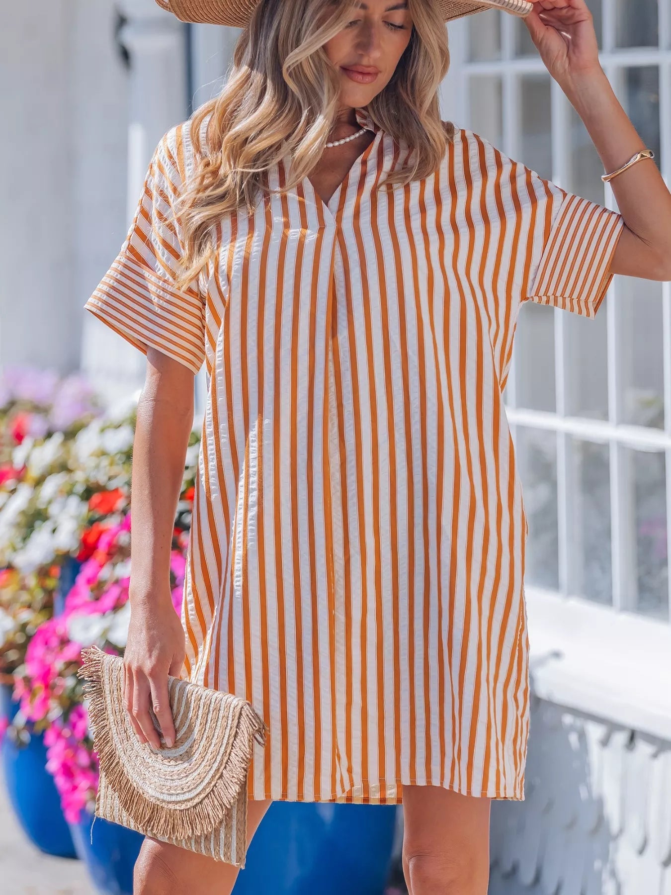 Plush Fashion Hub stripe pinched V-neck mini dress with turn-up cuffs and front pockets, stylish and comfortable for casual wear.