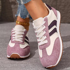 Women's casual suede striped lace-up sneakers by Trendsi, featuring comfortable design and stylish striped pattern.