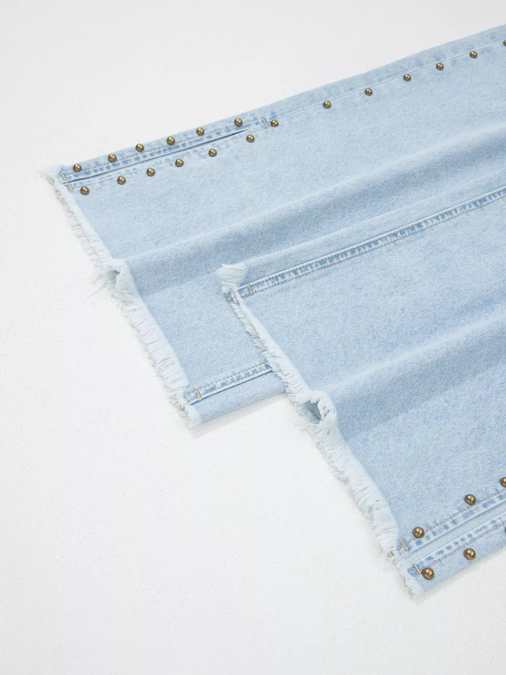 Trendsi studded wide-leg jeans with frayed hem and side slits, showcasing a trendy, casual denim style.