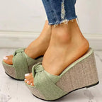 Fashion Slope women's bow sandals featuring stylish straps and comfortable soles, perfect for casual summer wear.