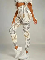 Tie-dye seamless high-waist leggings from FitiqueFit with scrunch butt design, perfect for casualwear and activewear.