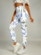 Colorful tie-dye seamless high-waist leggings from FitiqueFit with scrunch butt design, ideal for casualwear and activewear.