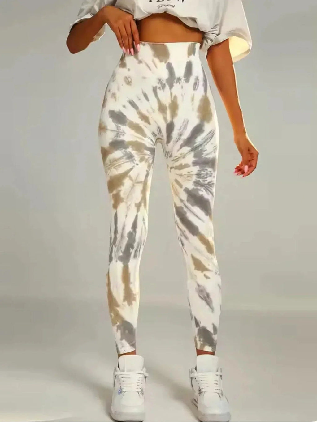Tie-dye seamless high-waist leggings by FitiqueFit featuring scrunch butt design for casualwear and comfortable fit.