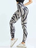 Tie-dye seamless high-waist leggings by FitiqueFit featuring scrunch butt design, ideal for casualwear and activewear.