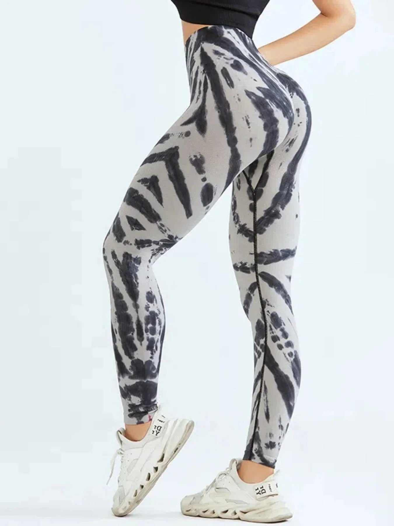 Tie-dye seamless high-waist leggings by FitiqueFit featuring scrunch butt design, ideal for casualwear and activewear.