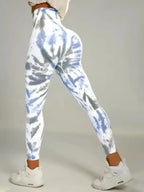 Tie-dye seamless high-waist leggings from FitiqueFit with scrunch butt design, ideal for casualwear and active comfort.