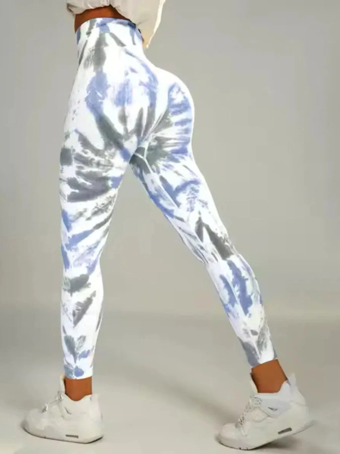 Tie-dye seamless high-waist leggings from FitiqueFit with scrunch butt design, ideal for casualwear and active comfort.