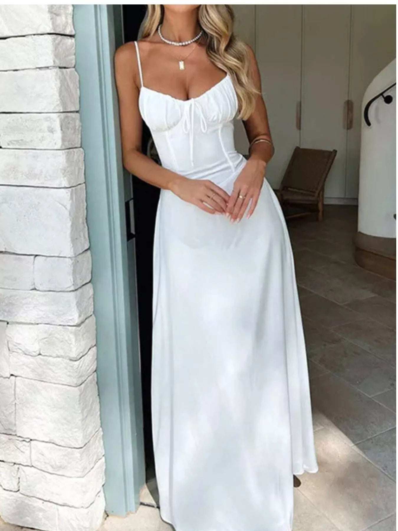 Sleeveless tie-front spaghetti strap maxi dress by Trendsi, casual summer long dress with a relaxed fit and lightweight fabric.