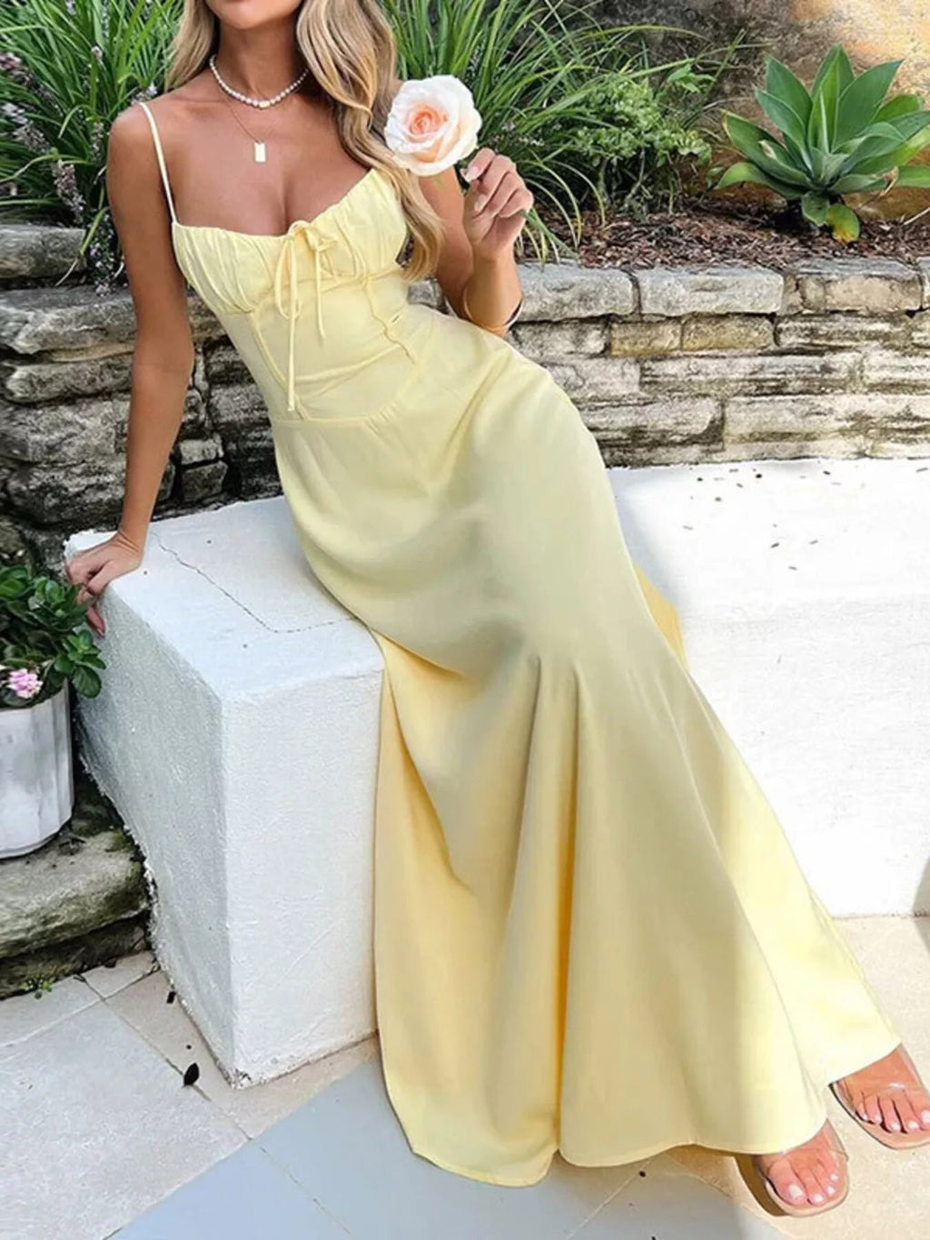 Sleeveless tie-front spaghetti strap maxi dress by Trendsi, casual summer long dress with a relaxed fit and lightweight fabric.
