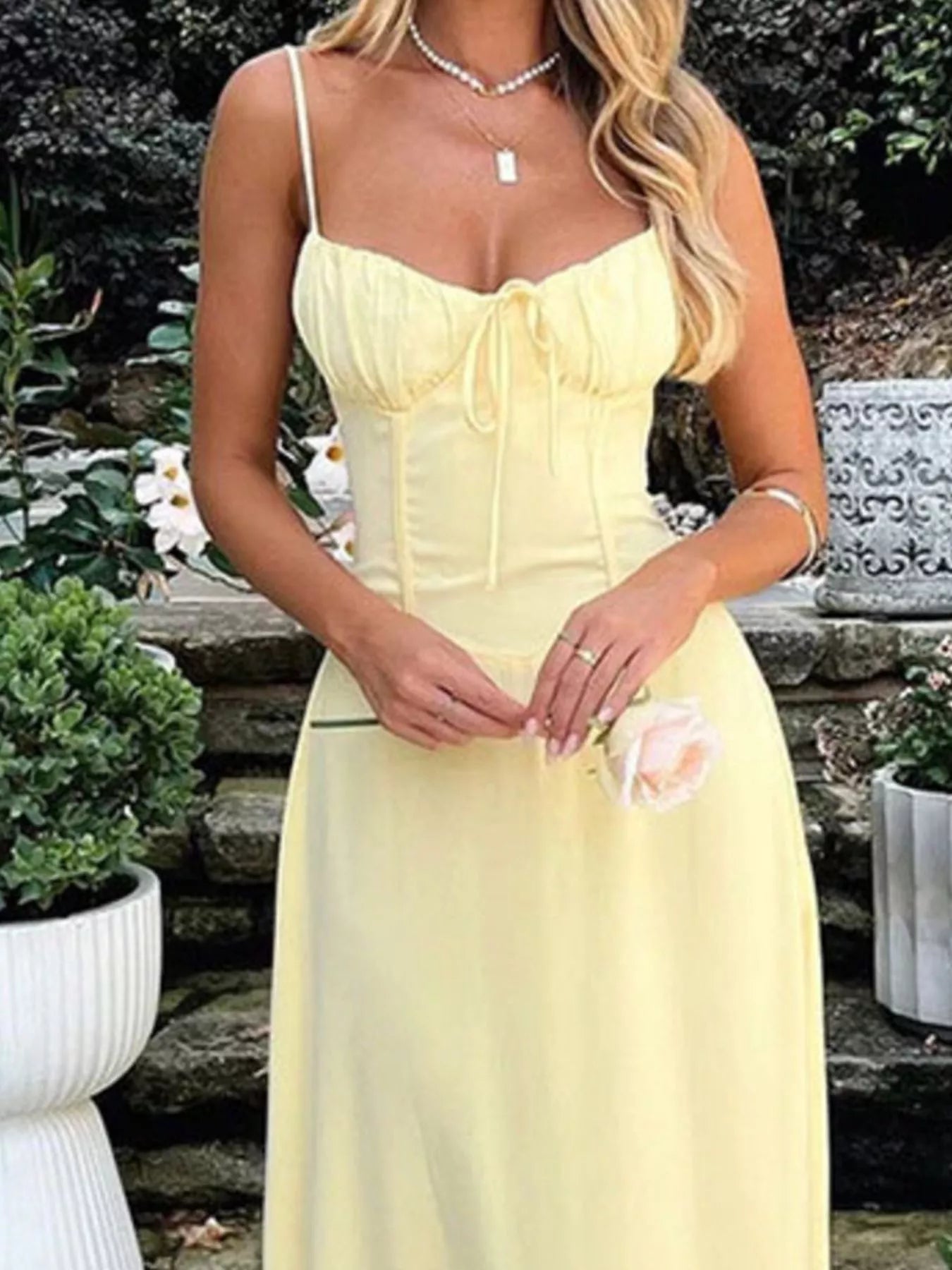 Sleeveless tie-front spaghetti strap maxi dress by Trendsi, casual summer long dress with a relaxed fit and flowy design.