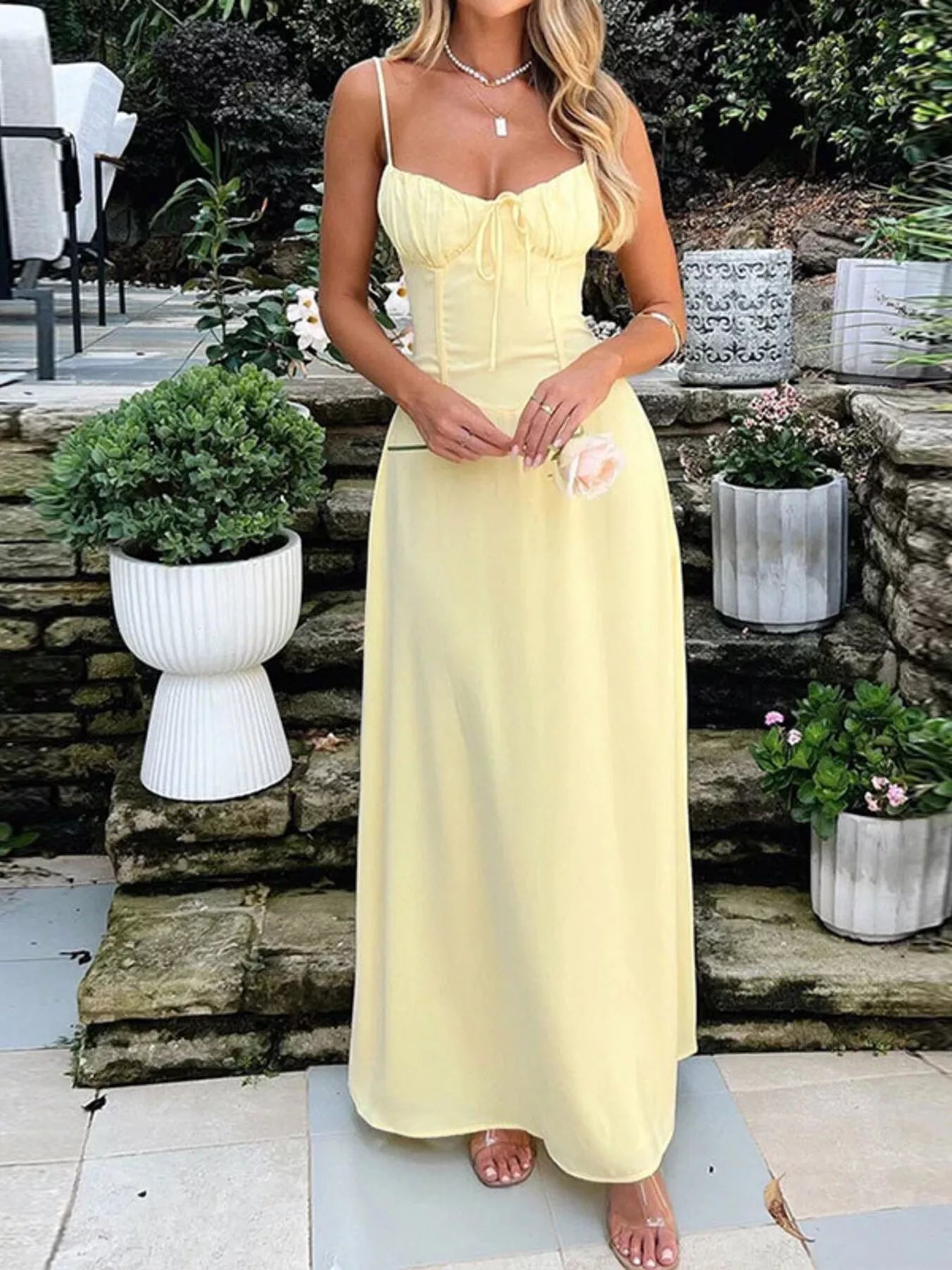 Sleeveless tie-front spaghetti strap maxi dress by Trendsi, casual summer long dress with a relaxed fit and flowing silhouette.