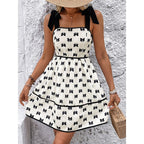 Plush Fashion Hub tie strap mini dress with smocked bodice and A-line silhouette, perfect for casual summer wear.